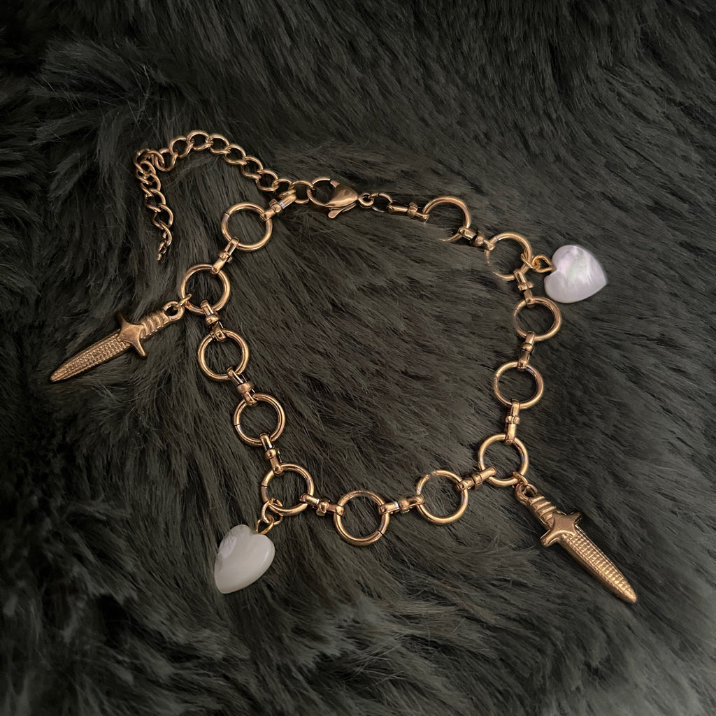Sovereign Sword & Shell Heart Charm Bracelet | Gold