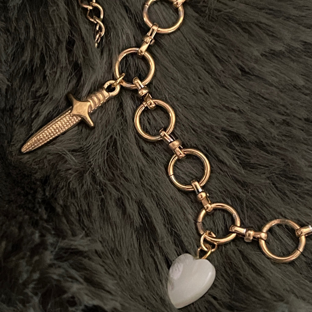 Sovereign Sword & Shell Heart Charm Bracelet | Gold