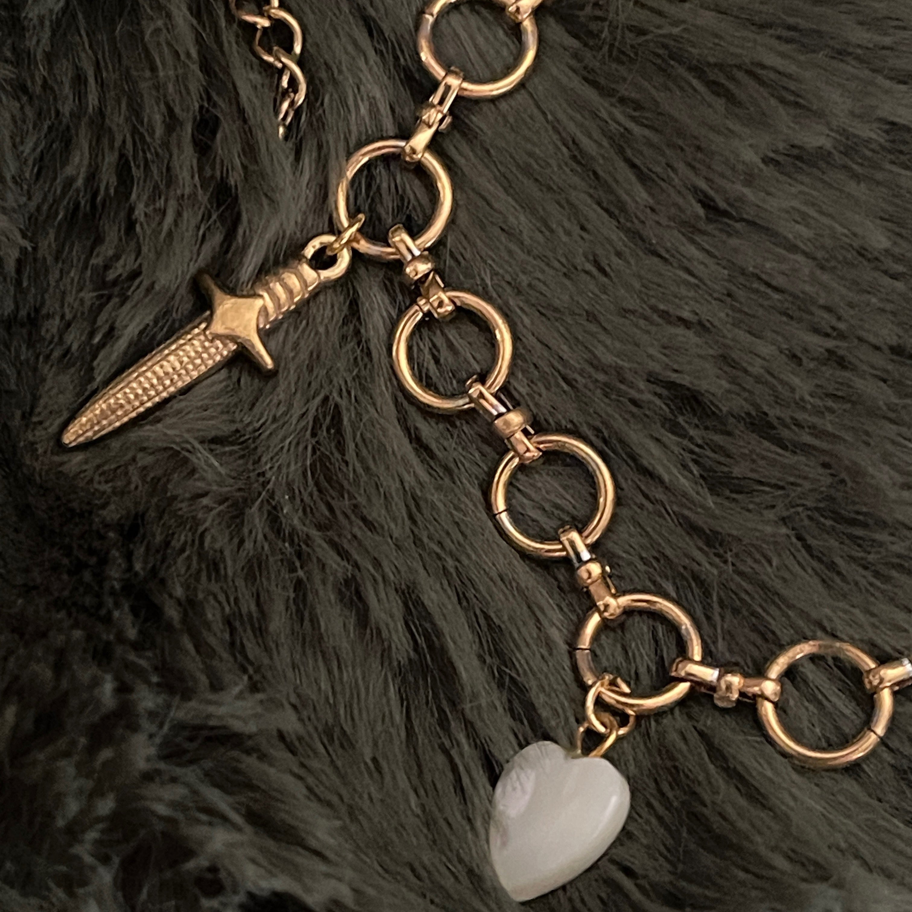 Sovereign Sword & Shell Heart Charm Bracelet | Gold