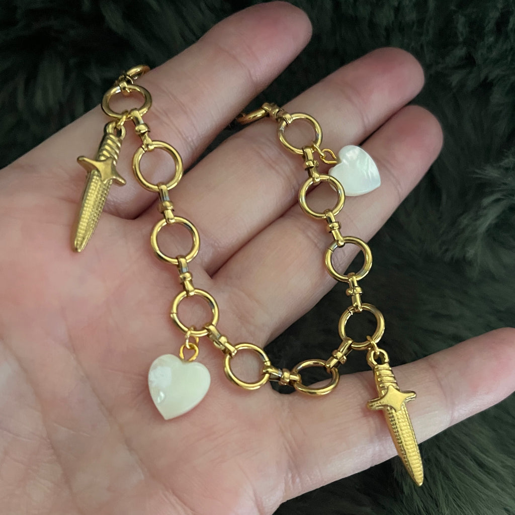 Sovereign Sword & Shell Heart Charm Bracelet | Gold
