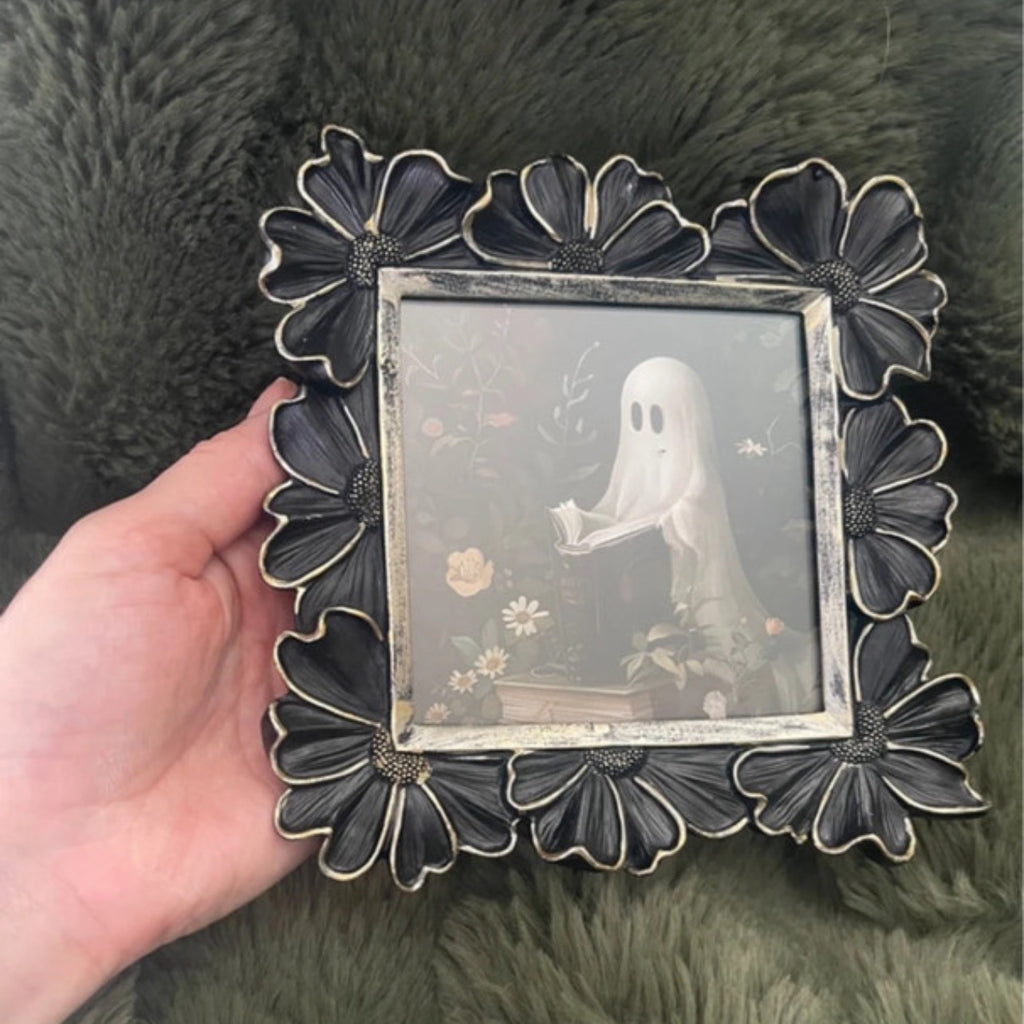 Black gothic pansy photo frame and a cute ghost picture.