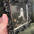 Black gothic pansy photo frame and a cute ghost picture.