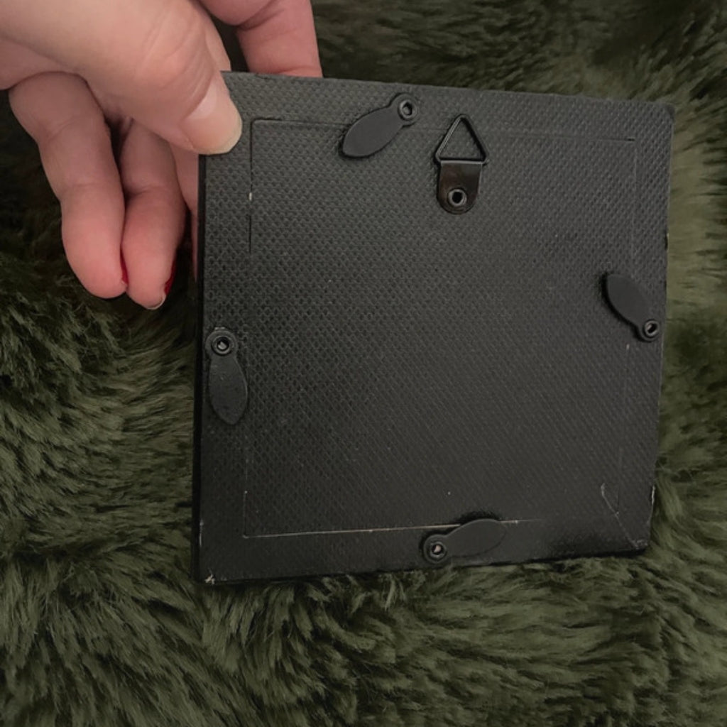 Black gothic square picture frame.