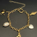 The Ocean Dreamer Charm Bracelet | Gold