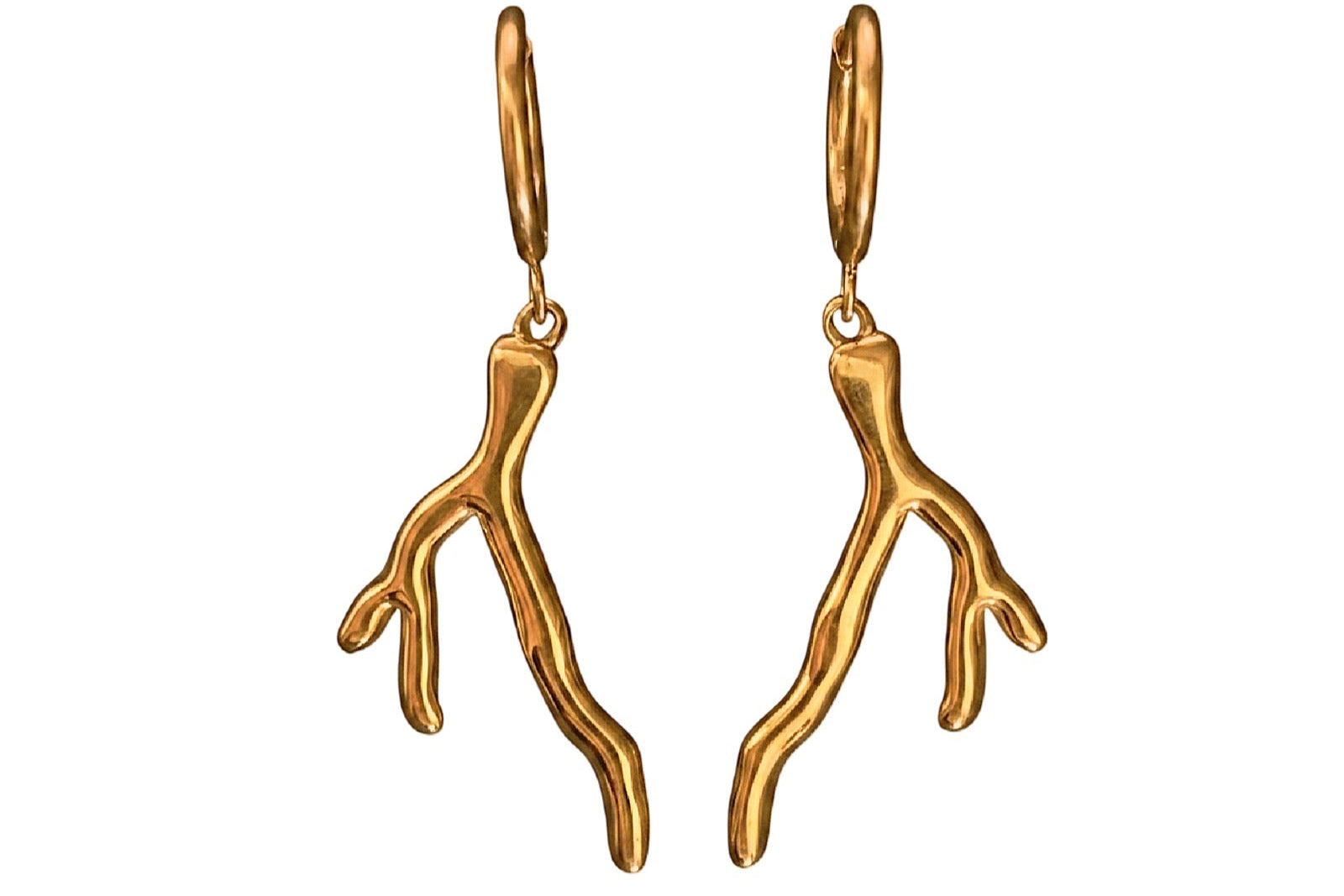 Gold coral-shaped earrings on a white background