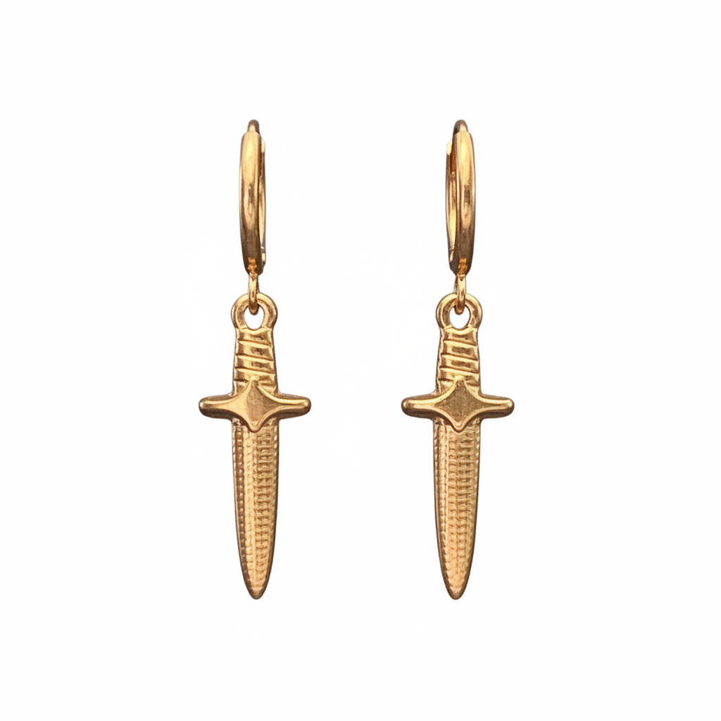 Gold dagger-shaped earrings on a white background