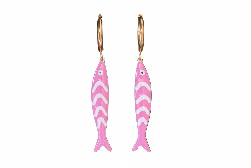 Pink fish-shaped earrings with gold hoops on a white background