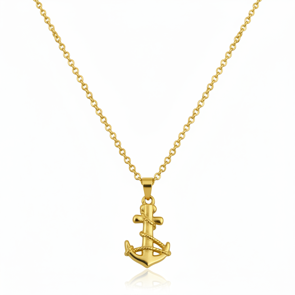 Gold anchor necklace on a white background.