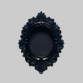 Decorative black oval frame on a gray background