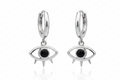 Silver hoop earrings with eye-shaped charms on a white background