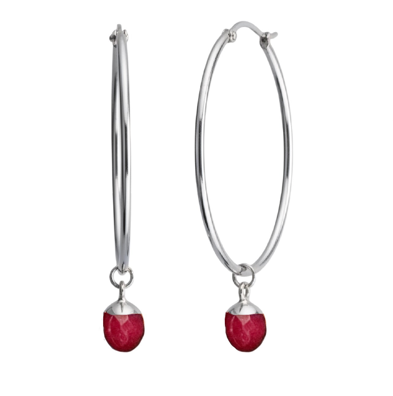 Silver hoop earrings with red gemstones on a white background