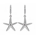 Starfish-shaped silver earrings on a white background