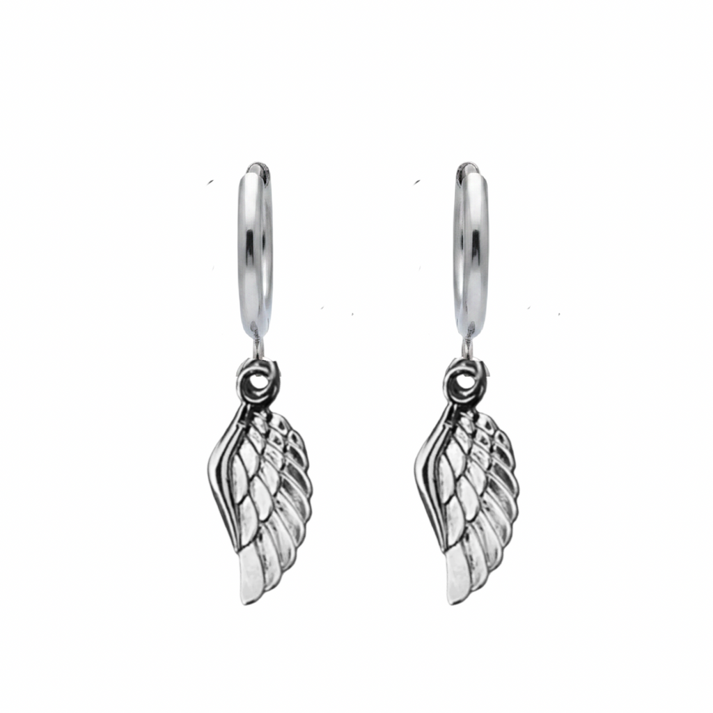 Silver wing-shaped earrings on a white background