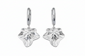 Pair of silver leaf-shaped earrings on a white background