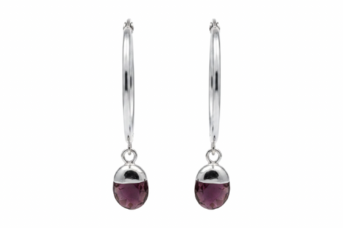 A pair of silver hoop earrings with small teardrop-shaped dark purple gemstone drops, shown against a plain white background.