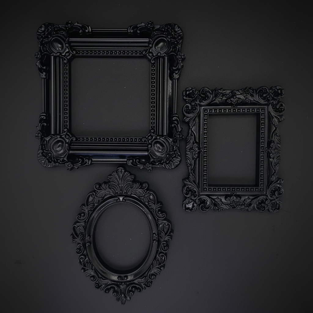Three ornate black picture frames on a dark background